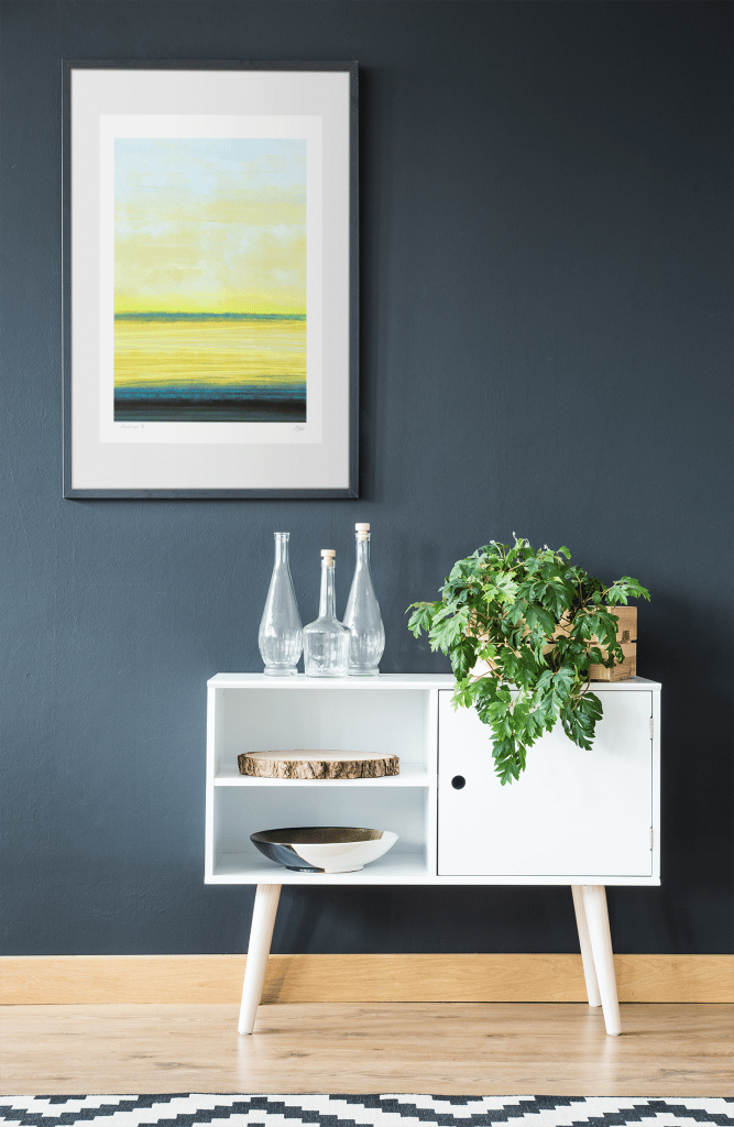 art print mockup featuring a piece of furniture with a plant 36343 r el2 5