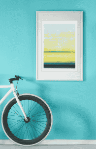 mockup of an art print hanging by a bicycle 35883 r el2 1