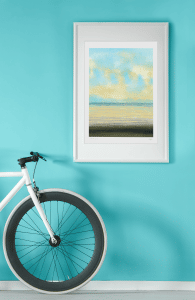mockup of an art print hanging by a bicycle 35883 r el2